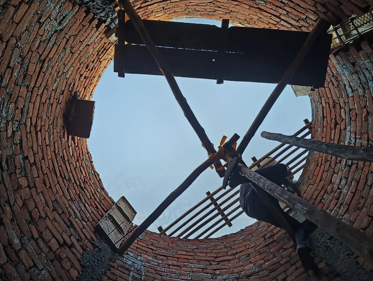 Looking up from inside the well